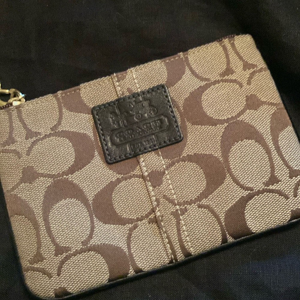 Coach zipper pouch on signature pattern